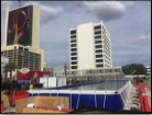 lap pool and tall building at the background