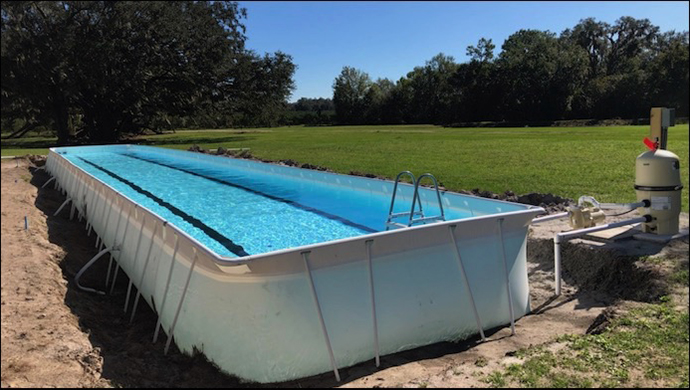 25 feet pool lying at the floor on grassy ground